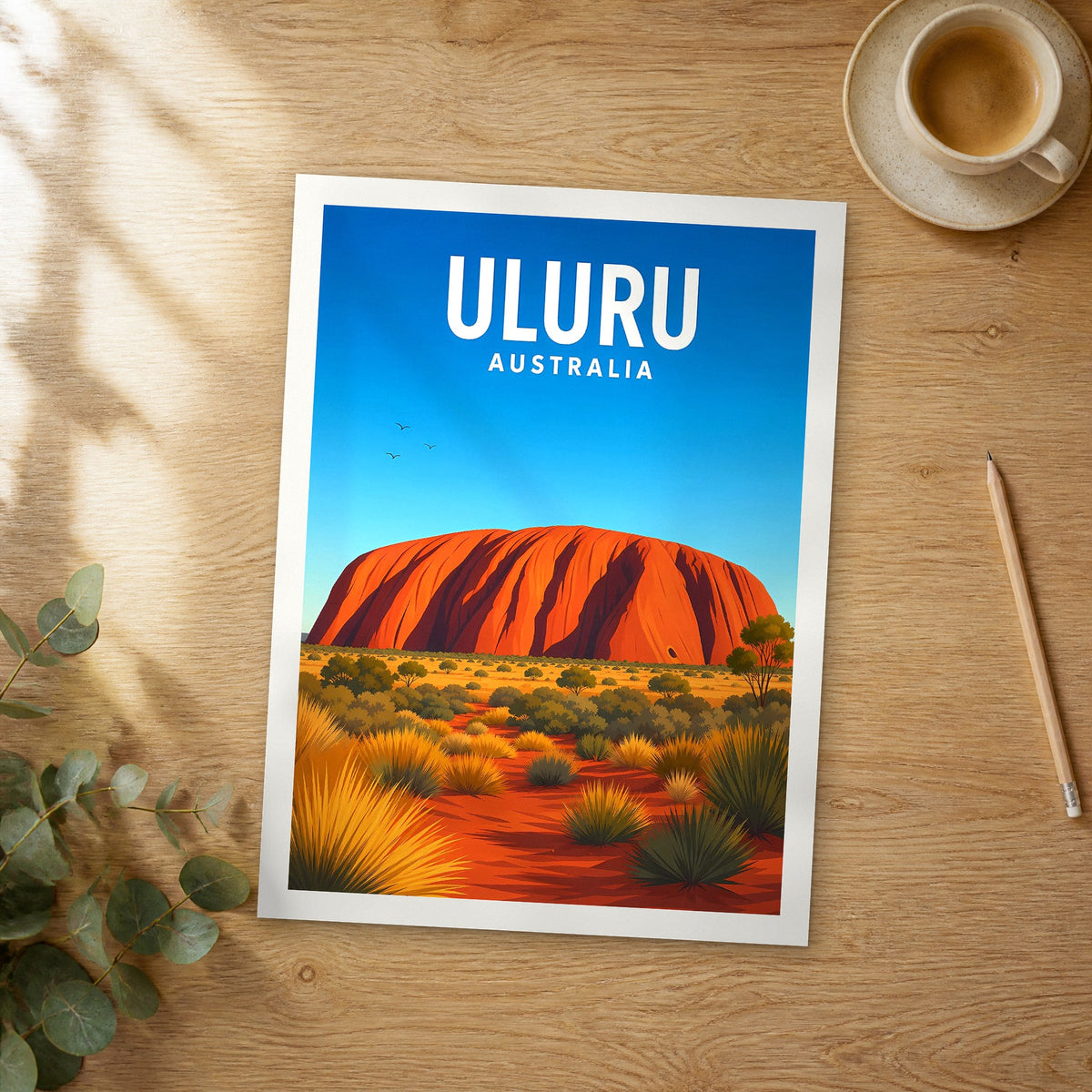 Unframed Uluru vibrant digital travel poster on a wooden table