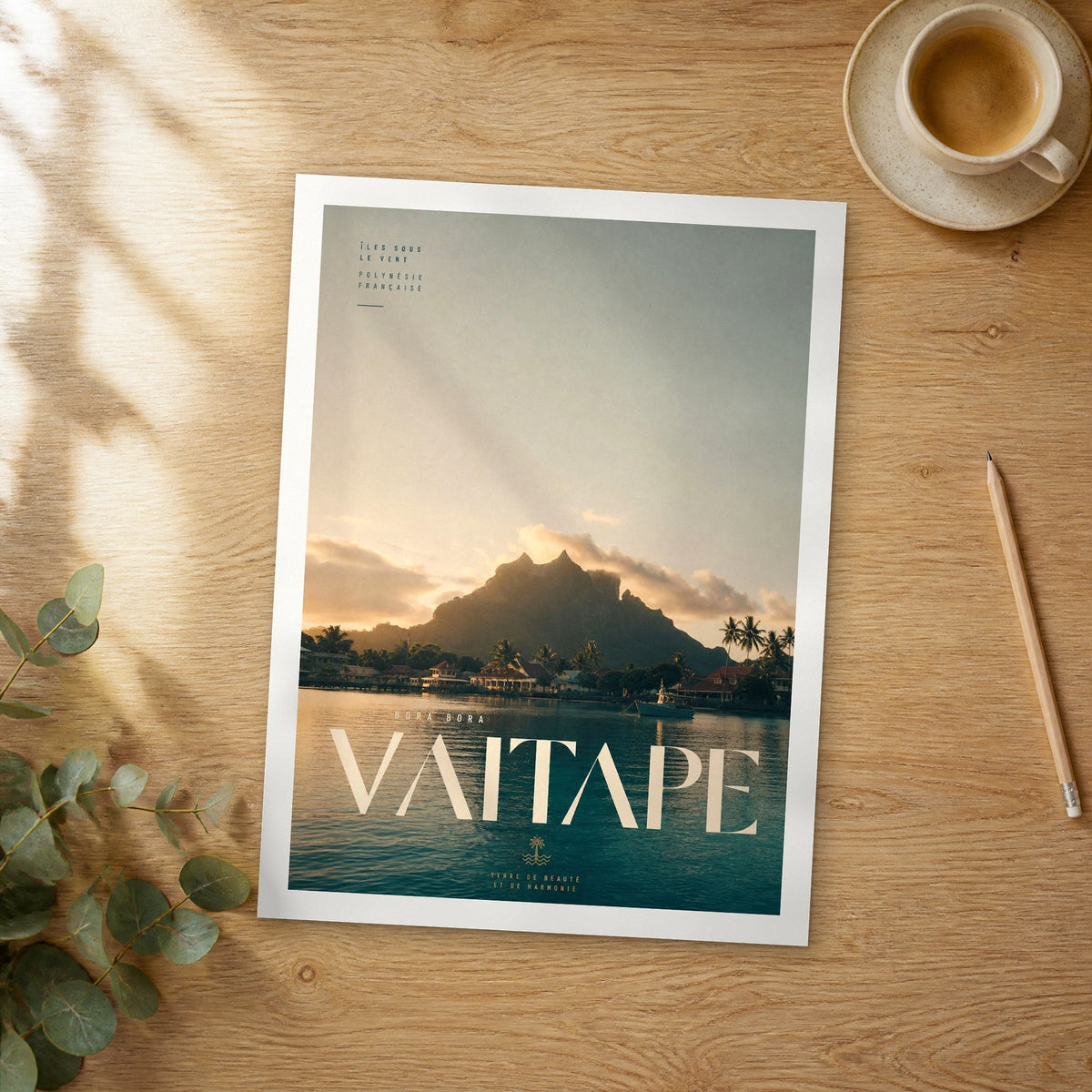 Unframed Vaitape bold typography travel poster on a wooden table