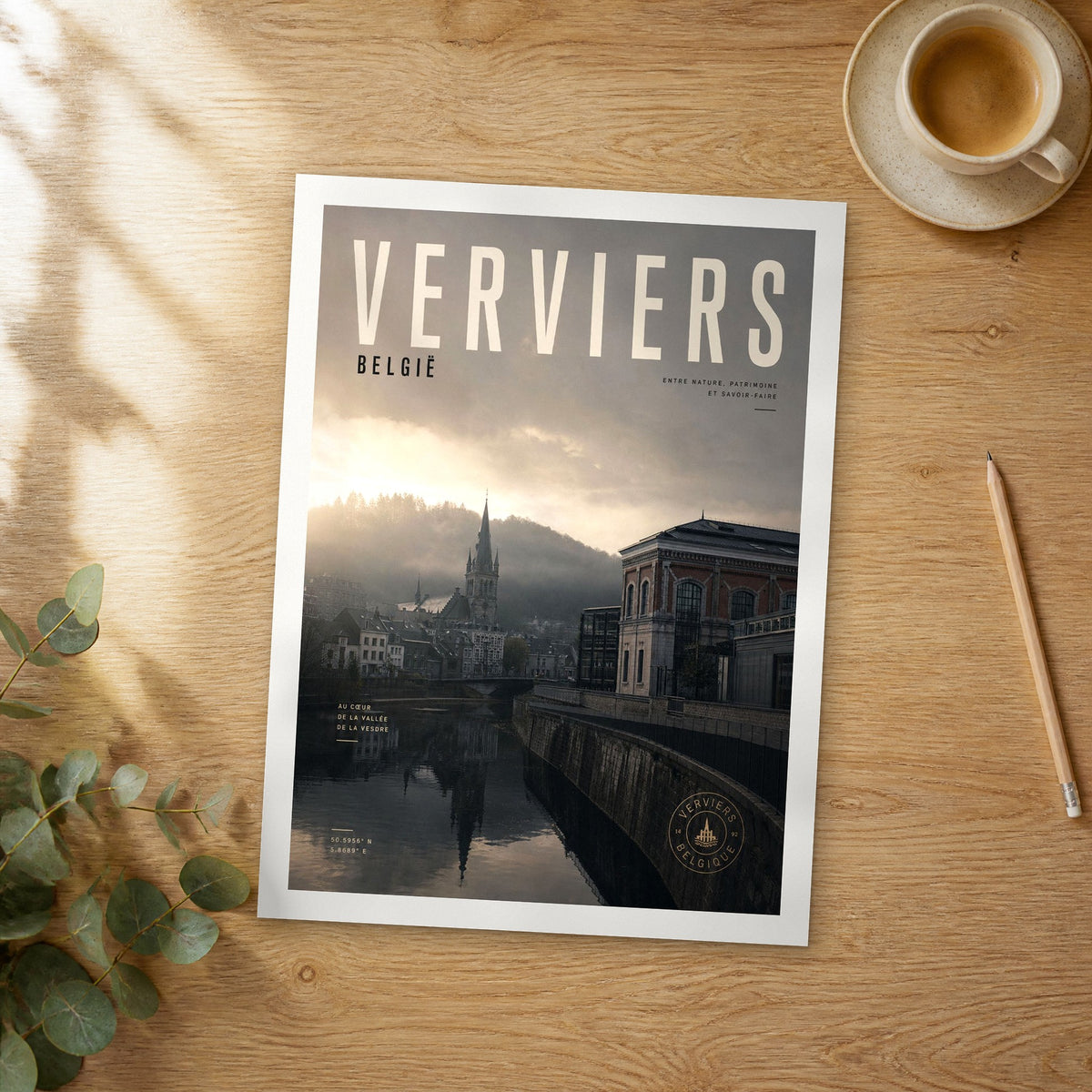 Unframed Verviers bold typography travel poster on a wooden table