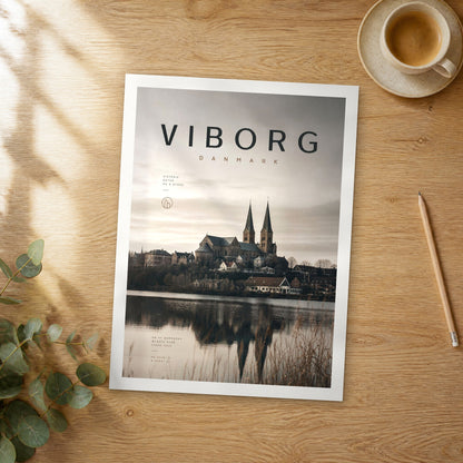 Unframed Viborg bold typography travel poster on a wooden table