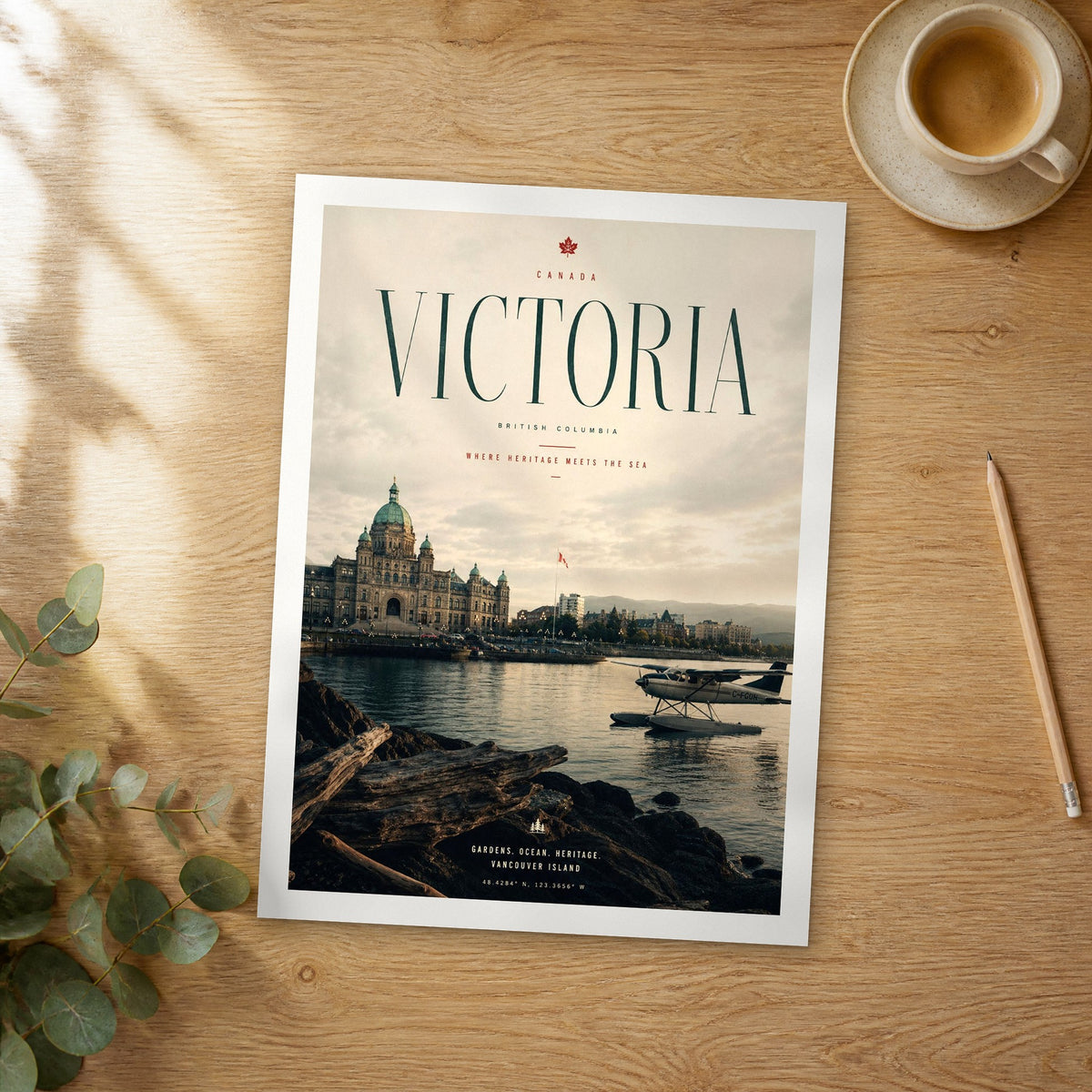 Unframed Victoria bold typography travel poster on a wooden table