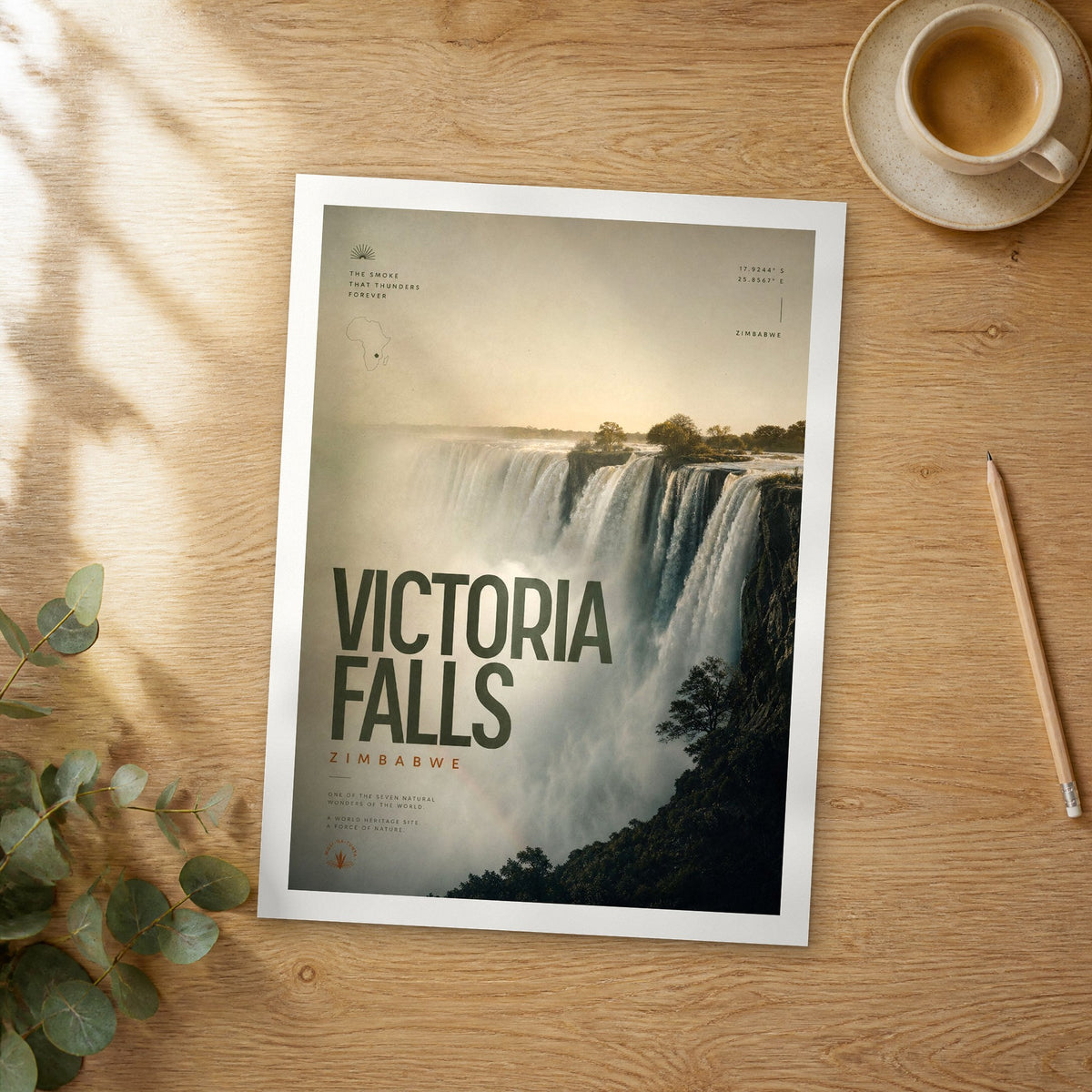 Unframed Victoria Falls Misty Gorge Cascade bold typography travel poster on a wooden table