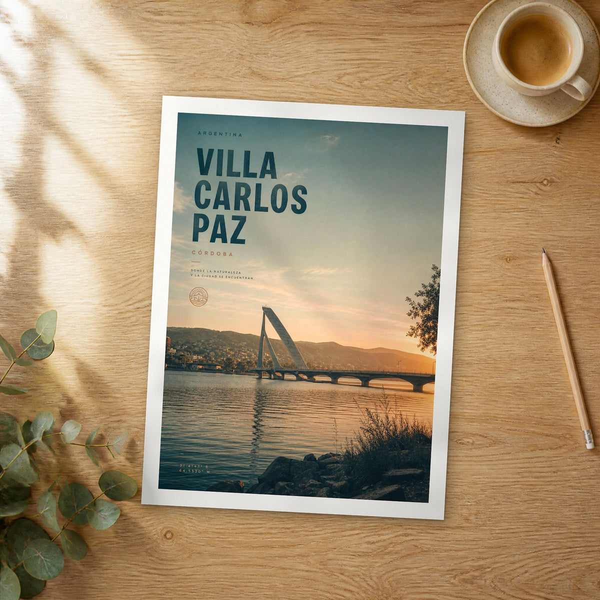 Unframed Villa Carlos Paz bold typography travel poster on a wooden table