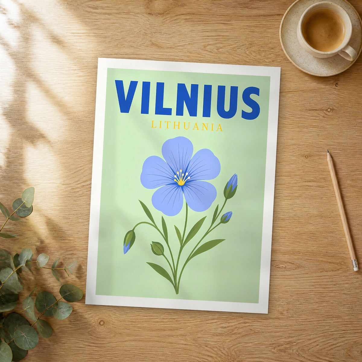 Unframed Vilnius pop art travel poster on a wooden table
