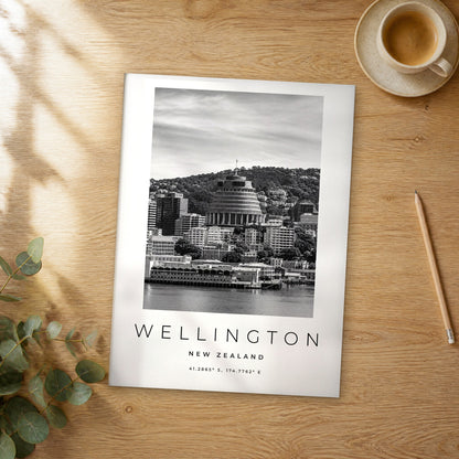 Unframed Wellington black and white travel poster on a wooden table