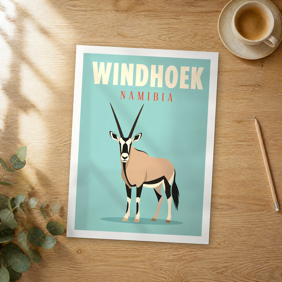 Unframed Windhoek pop art travel poster on a wooden table