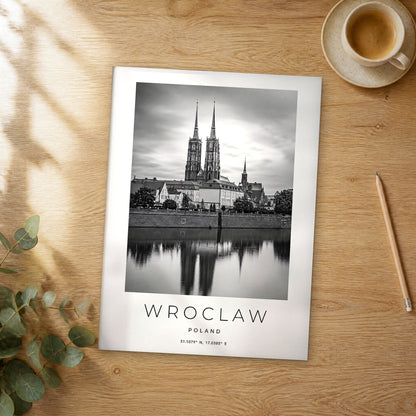 Unframed Wroclaw black and white travel poster on a wooden table