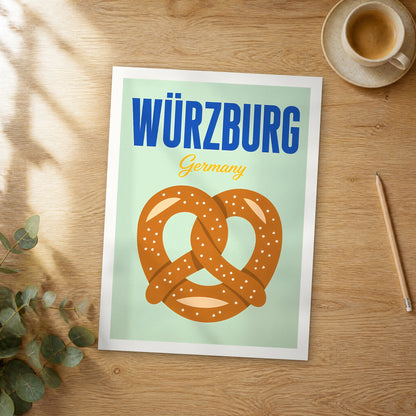 Unframed Würzburg pop art travel poster on a wooden table
