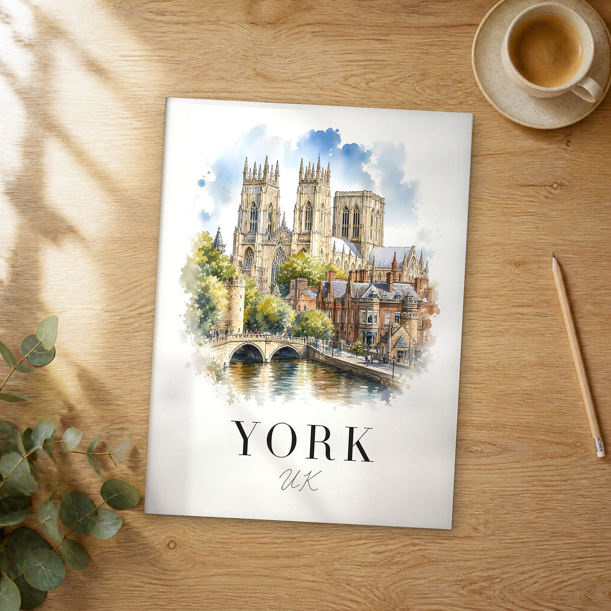 Unframed York watercolor travel poster on a wooden table