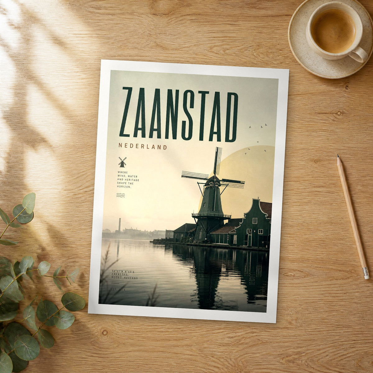Unframed Zaanstad bold typography travel poster on a wooden table